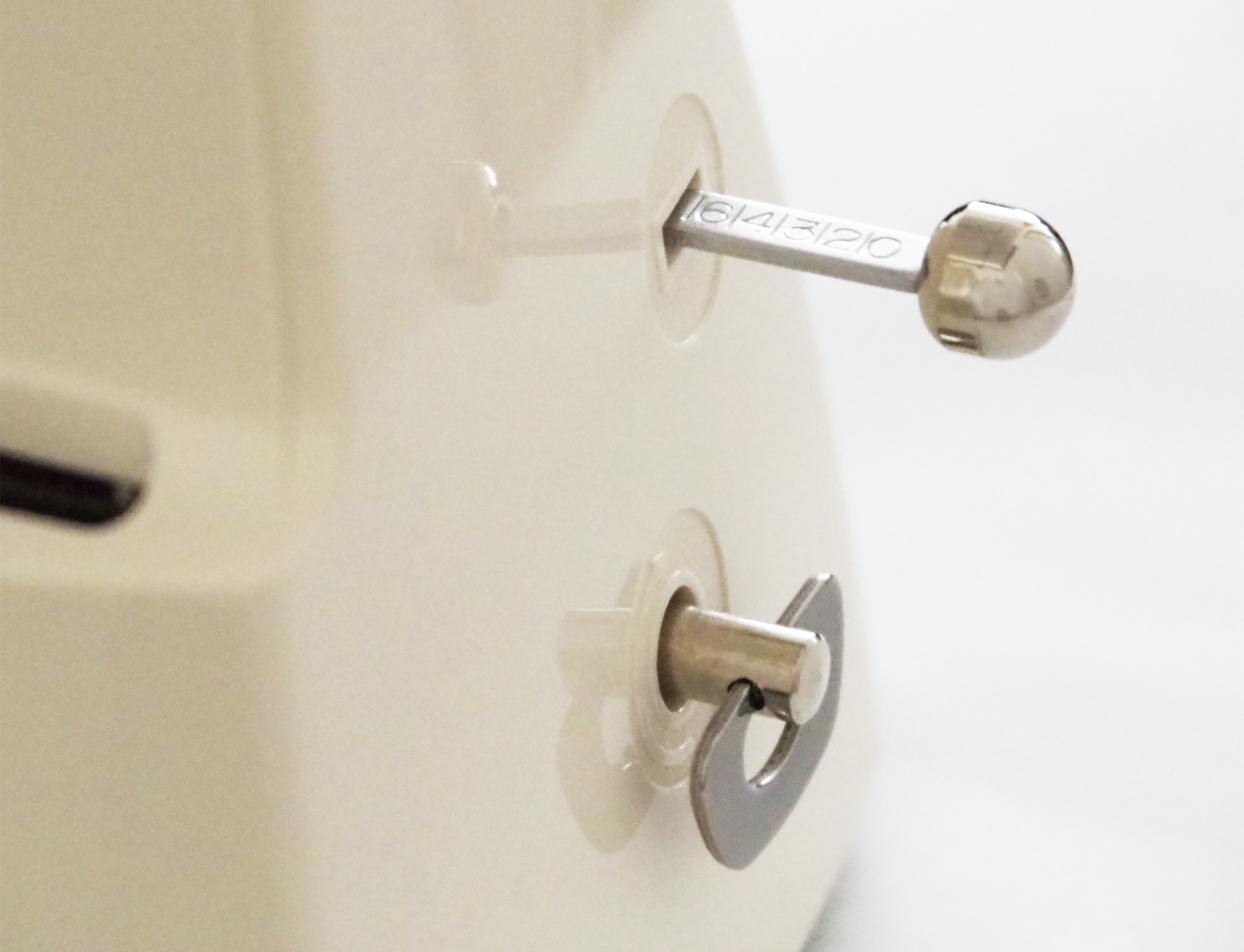 巻カギ_拍子切換ツマミ